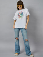Woman in sunglasses wears 98degreenorth Typography Graphic T-shirt – Relax Fit Cotton Round Neck with ripped jeans.