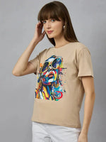 Woman in 98degreenorth Typography Print Women’s Cotton T-shirt, relaxed fit, against a plain gray background.