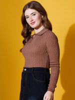 Woman in 98degreenorth Camel Ribbed Collar Sweater smiles against a yellow background, pairing it with dark jeans.