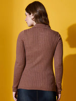 Woman in 98degreenorth Camel Ribbed Collar Sweater, handcrafted winterwear, stands against a yellow background.