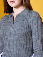 Woman in a 98degreenorth Medium Grey Ribbed Collar Sweater, cozy knit for everyday comfort, against a yellow background.