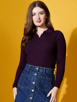 A woman models the 98degreenorth Rosewood Collar Ribbed Sweater, a chic slim-fit winter knit, against a yellow backdrop.
