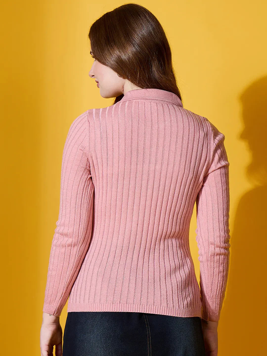 98degreenorth Women Salmon Ribbed Collar Neck Sweater styled for winter outings, set against a yellow background.