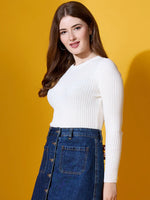 Woman wears 98degreenorth White Ribbed Sweater, a premium soft knit winter top, styled with a denim skirt.