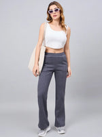 Woman wearing 98degreenorth Women’s Anthra Fleece Flared Sweatpants for a chic, casual street style look.