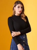 Woman wears 98degreenorth Black Ribbed High-Neck Slim Fit Sweater with denim skirt, standing against a yellow background.