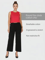 Woman in a red crop top and 98degreenorth Women's Black Wide-Leg Cotton Pants — High-Rise Stretch Trousers.