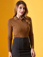 Woman wears 98degreenorth Women’s Brown Ribbed Collar Neck Sweater with a high-waisted black skirt, on a yellow background.