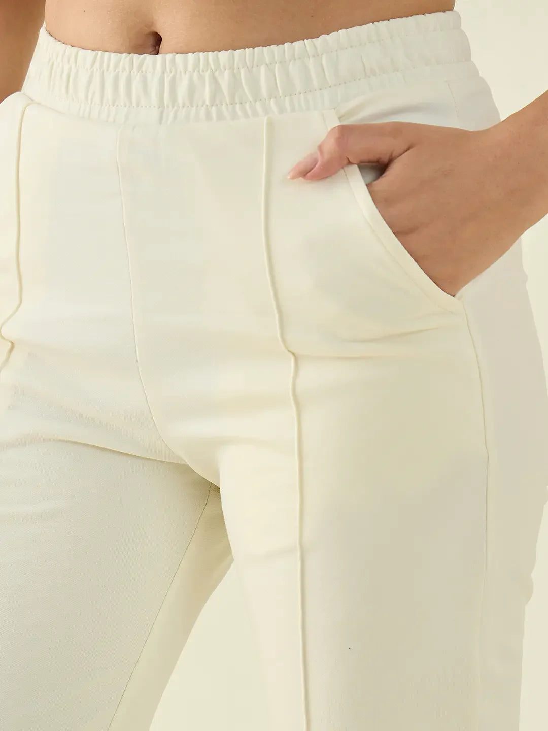 Model wears 98degreenorth Women’s Butter Straight Fit Cotton Stretchable Trousers, hand in right pocket.