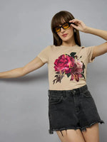 Woman in sunglasses wears the 98degreenorth women’s casual typography t-shirt, posing against a plain gray background.