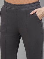 Model wears 98degreenorth Women’s Charcoal Grey Bootcut Sweatpants, shown waist to mid-thigh against a neutral backdrop.