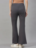 Woman wears 98degreenorth Charcoal Grey Bootcut Sweatpants—high-waist flared joggers—against a plain background.