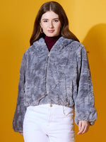 Woman in a 98degreenorth Charcoal Grey Faux Fur Jacket stands against a yellow background.