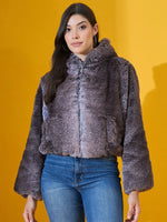 Woman wears 98degreenorth Women’s Coffee Brown Faux Fur Jacket, perfect for cozy winter evenings and getaways.