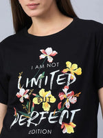 Woman in a 98degreenorth Women’s Cotton Typography Graphic Tee – Casual Streetwear Style.