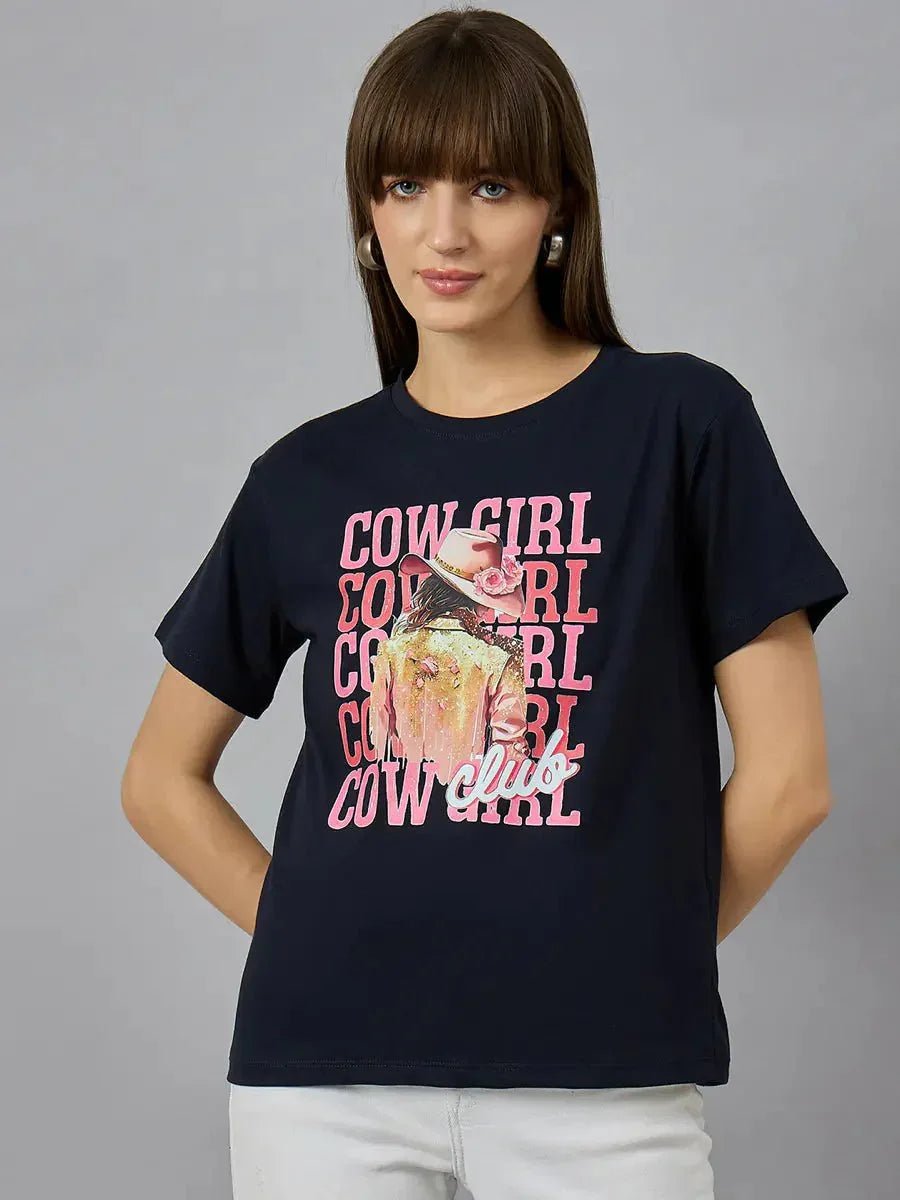 Woman in a 98degreenorth Women’s Cotton Typography Graphic Tee – Relaxed Fit, paired with light jeans.