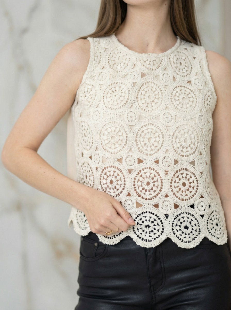 98degreenorth Women's Crochet Lace Sleeveless Top in beige with scalloped hem—an elegant summer wardrobe addition.