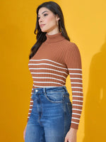 Woman in a 98degreenorth Dark Camel Ribbed Turtleneck Sweater stands against a bright yellow background.