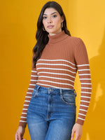 Woman wears 98degreenorth’s Dark Camel Ribbed Turtleneck Sweater, standing before a vibrant yellow background.