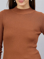 98degreenorth Women's Dark Camel Turtle Neck Ribbed Sweater—Soft, stretchable knit winter top, shown waist up.