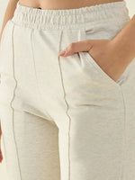 Close-up of 98degreenorth Women’s Ecru Straight Fit Cotton Stretchable Trousers, minimalist neutral casual pants.