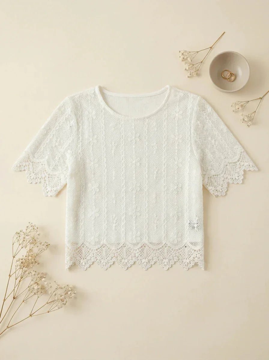 98degreenorth Women's Embroidered Lace Crop Top - Beige with scalloped hem, styled with dried flowers and gold rings.