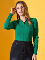 Woman wears 98degreenorth's emerald green ribbed collar slim fit sweater with dark jeans against a yellow background.