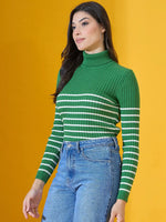 Woman wears a 98degreenorth Fern Green Ribbed Knit Turtleneck Sweater, showcasing cozy winter style.