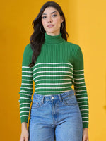 Woman in 98degreenorth’s Fern Green Ribbed Knit Turtleneck Sweater and blue jeans, against a yellow background.