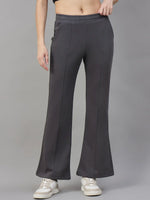 98degreenorth Women’s Flared Sweatpants in Charcoal Grey—warm fleece bootcut pants styled with white sneakers.