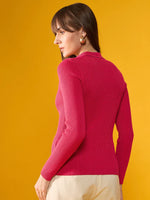 Woman models 98degreenorth’s fuchsia pink ribbed collar sweater—sleek style for casual or formal looks.