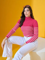 Woman in a 98degreenorth fuchsia ribbed knit turtleneck sweater sits on a stool against a yellow background.