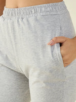 Model wears 98degreenorth Women’s Light Grey Flared Fit Bootcut Cotton Stretchable Trousers with side pocket.