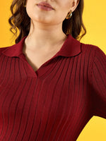 Woman in a 98degreenorth maroon ribbed collar neck slim fit sweater, standing against a yellow background.