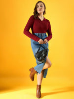 Woman wears 98degreenorth’s maroon ribbed collar neck slim fit sweater with denim skirt, black bag, and brown boots.