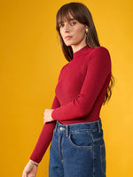 Person in a 98degreenorth maroon ribbed slim fit turtle neck sweater and blue jeans stands against a yellow background.