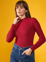 Model in a maroon ribbed slim fit sweater by 98degreenorth poses against yellow, highlighting winterwear for women.