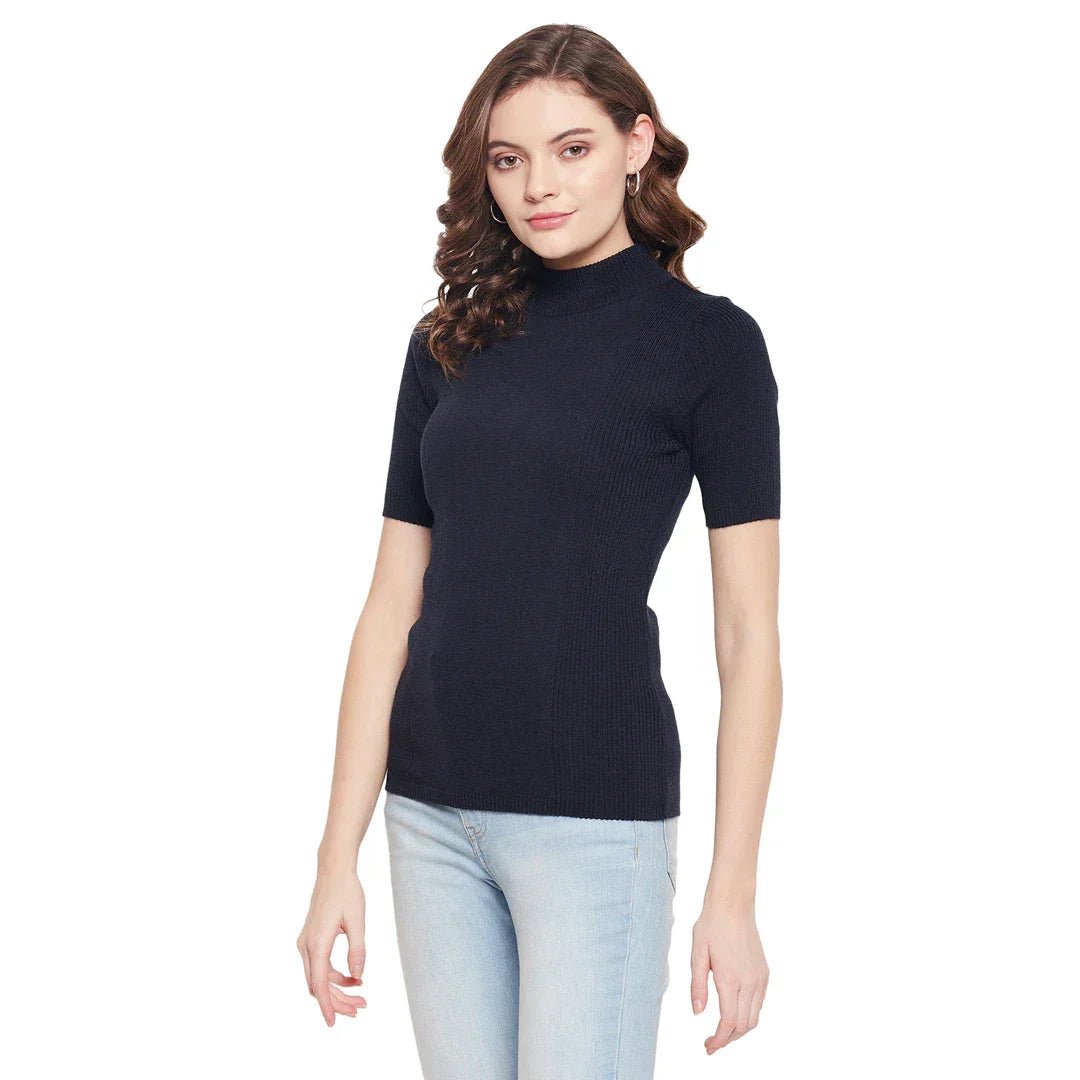 Woman in a 98degreenorth navy blue ribbed half sleeve slim fit turtle neck sweater, standing against a white background.