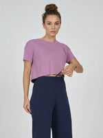 Woman in 98degreenorth Navy Blue Wide-Leg High-Rise Pants stands against a plain background.
