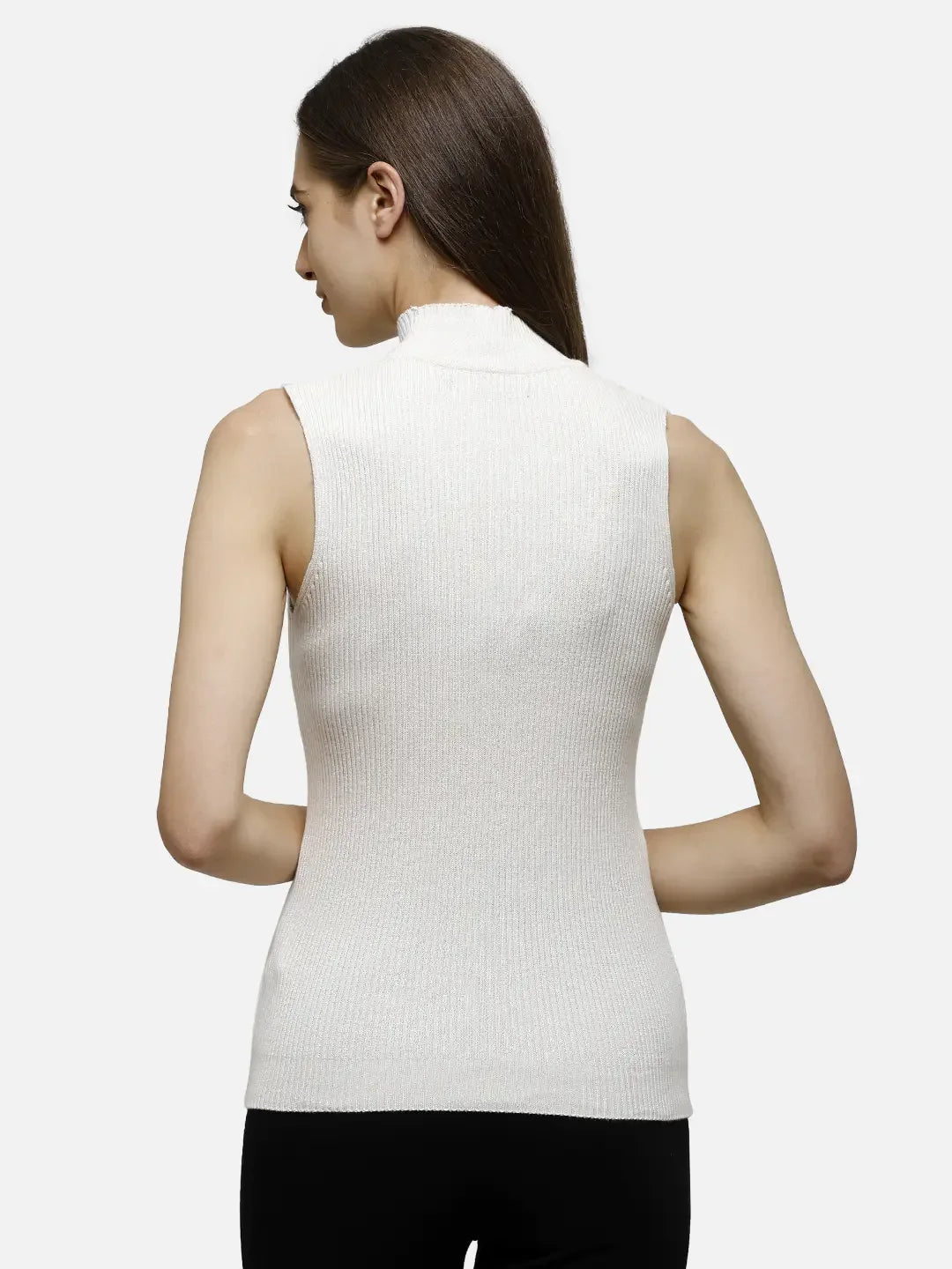 Woman facing away, wearing 98degreenorth Off-White Ribbed High Neck Sleeveless Knit Top with black pants.