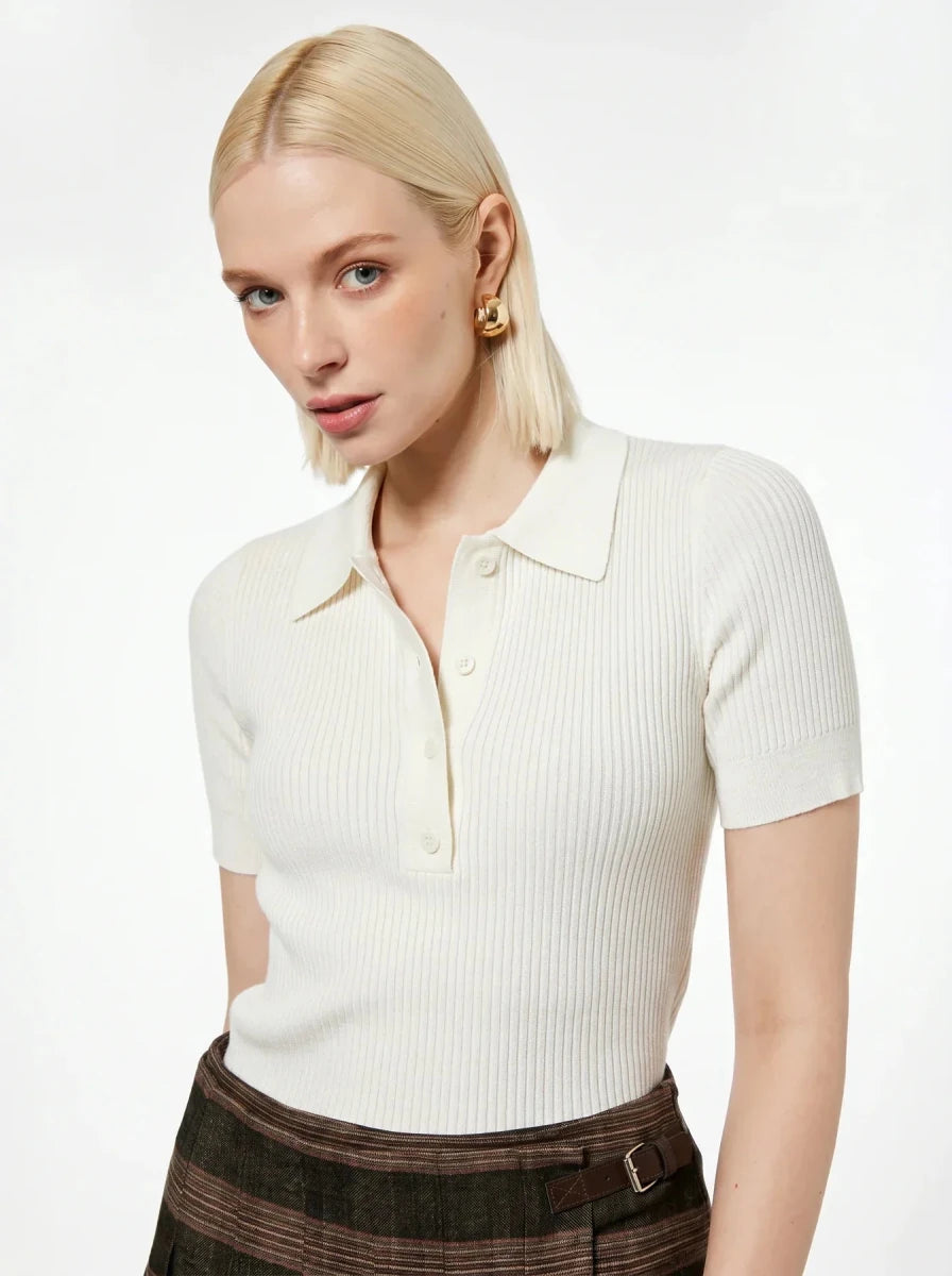 Woman with blonde hair wears 98degreenorth's Off-White Ribbed Knit Polo Top against a white background.