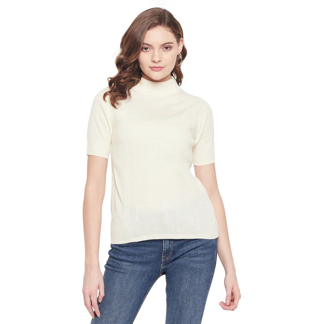 Woman wears 98degreenorth off white slim fit ribbed turtle neck sweater with blue jeans against a white background.