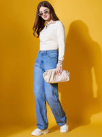 Woman in sunglasses, jeans, and sneakers wears a 98degreenorth off-white striped collar knit sweater, holding a beige clutch.