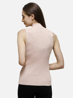 Woman with long brown hair in a 98degreenorth pink ribbed high neck sleeveless knit top, shown from the back.