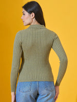 Woman in a 98degreenorth Pista Melange ribbed collar neck sweater and blue jeans, against a yellow background.