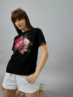 A woman models the 98degreenorth Women’s Regular Fit Typography Print Cotton T-shirt – Everyday Wear.
