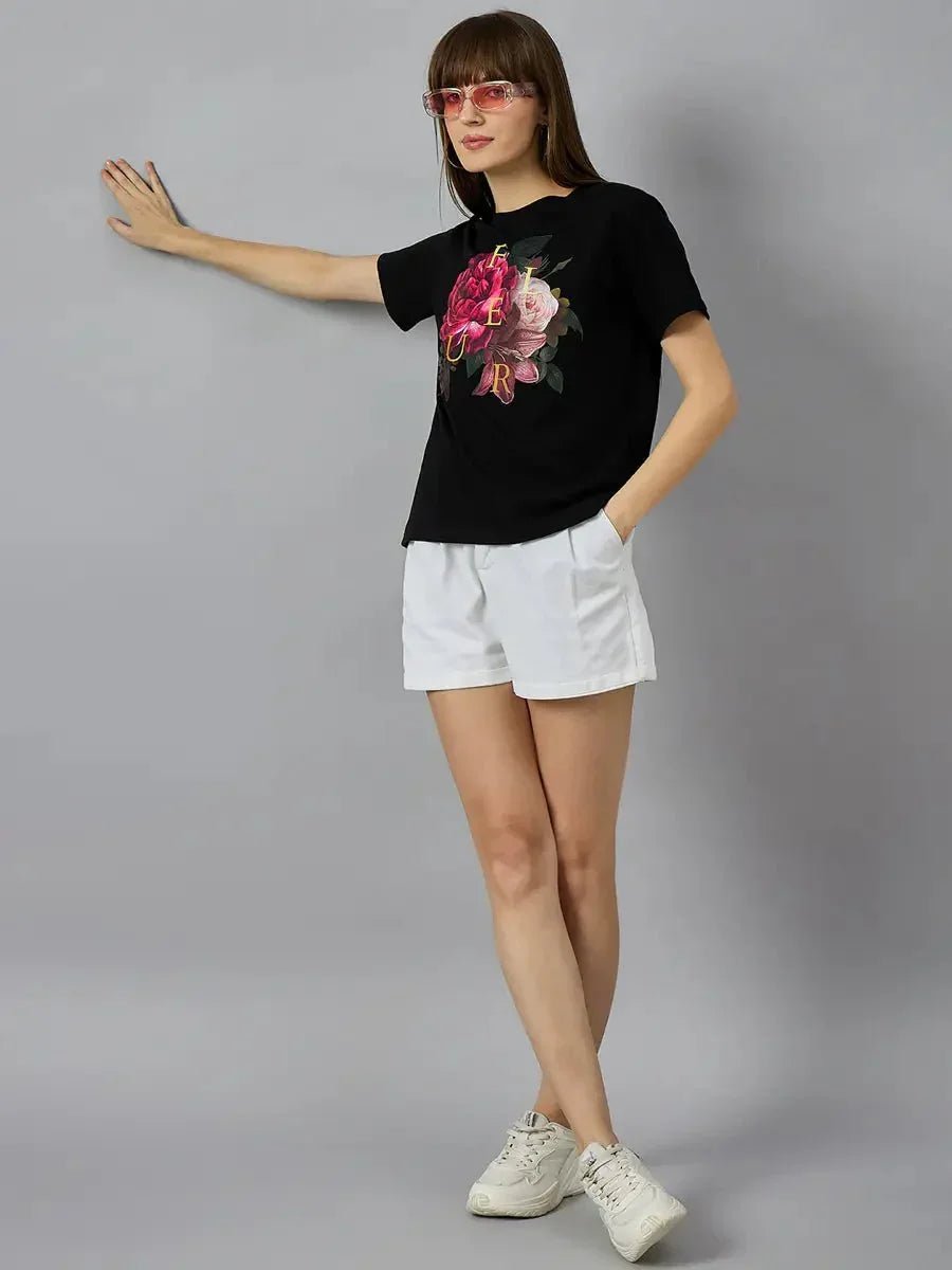 Woman in sunglasses wears a 98degreenorth Women’s Regular Fit Typography Print Cotton T-shirt—streetwear essential.