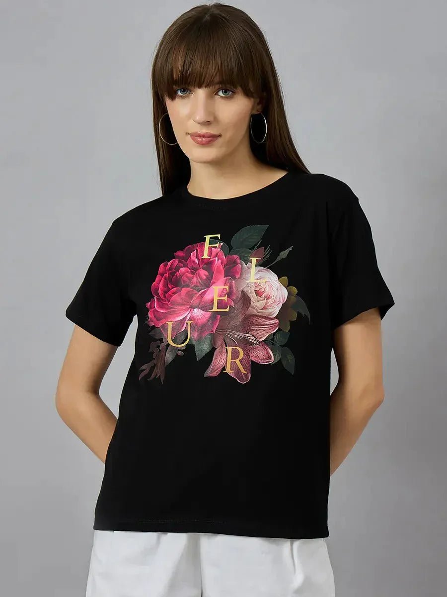 Woman in a 98degreenorth Typography Print Cotton T-shirt – Everyday Wear, your streetwear must-have against gray.