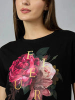 A woman in a 98degreenorth Women’s Regular Fit Typography Print Cotton T-shirt – Everyday Wear.