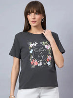 Woman in 98degreenorth Women’s Relaxed Fit Typography Printed Cotton Tee – Street Style, against a plain background.